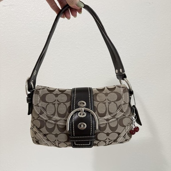 Coach Handbags - Coach Tan and Black Signature Shoulder Bag